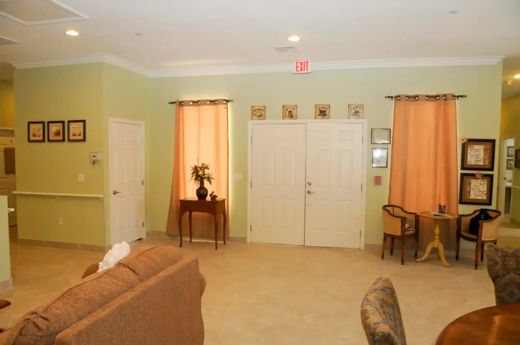 An area in which you see a door with an exit sign at Nevada memory care