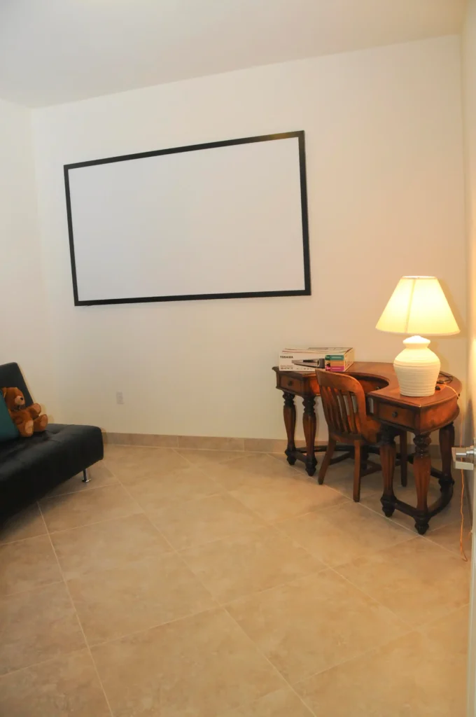 A senior healthcare center with a TV and table.